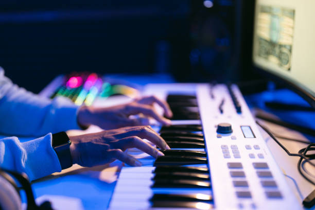 istock Top view of a sound producer hands working at studio 1441512257