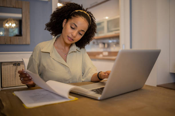 istock Young woman working from home 1441515636