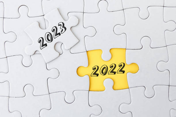 istock 2023, 2023 on puzzle background, business concept. 1441522679