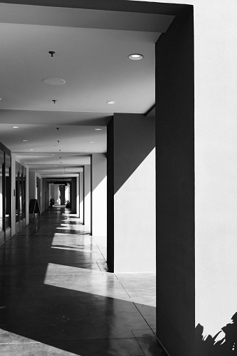 empty marble floor with abstract architecture exterior for copy space.