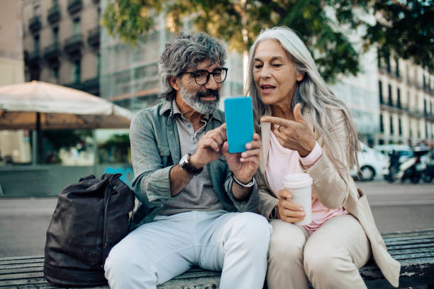 istock Mature couple on a journey taking a break while sightseeing 1441532039