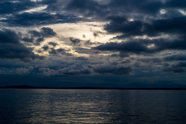 A dramatic Elliott Bay view from Pier 62 in Seattle, WA.