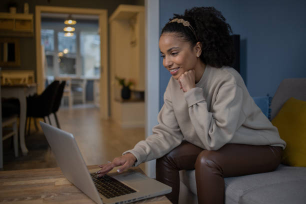 istock Young woman working from home 1441537479