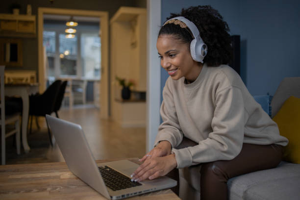 istock Young woman working from home 1441537484