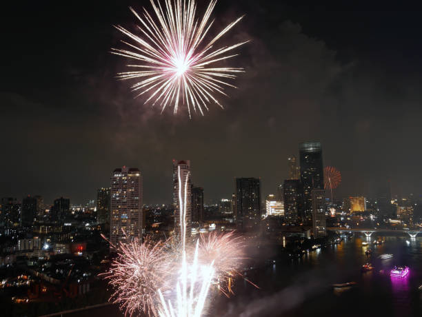 istock High angle view Fantastic Multicolor Long Exposure shot of Fireworks over Chao Phraya River, Cityscape of Bangkok, Festival, Celebration, Happy New Year, Business Architecture. 1441539621