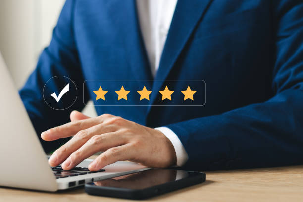 istock User give rating to service experience on online application, Customer review satisfaction feedback survey concept, Customer can evaluate quality of service leading to reputation ranking of business. 1441541916