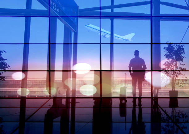 istock Businessman is walking at airport 1441543168