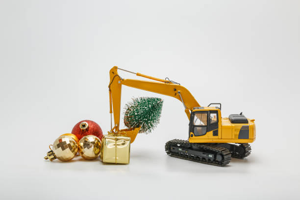 istock Crawler Excavator used bucket lift up christmas tree . 1441544947