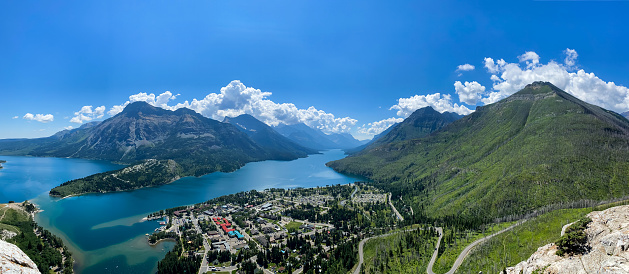 The Körbersee, embedded in the Lechquellen Mountains, from above on a sunny summer day.