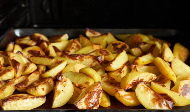 Fried potato wedges, close-up. Concept - potato dishes.
