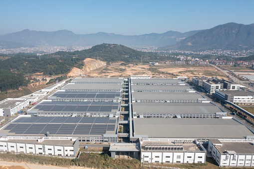 Solar power station on the roof of a factory in Fujian province, China