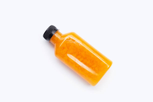 istock Marian plum fruit juice bottle isolated on white background 1441557350