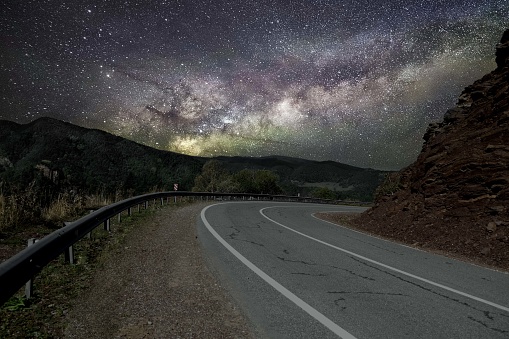 milky way in the mountains mountain road forest stars mountains horizon