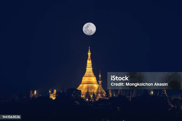 Shwedagon Pagoda On Hill At Fullmoon Night Famous Sacred Place And Tourist Attraction In Yangon Myanmar Stock Photo - Download Image Now