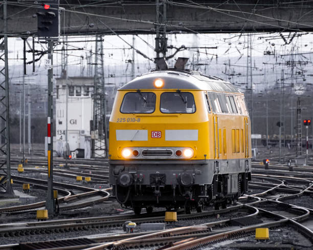Giessen, Germany – March 19, 2021: A Diesellokomotive 225 010-8 from Deutsche Bahn in Giessen on rail road tracks at a station