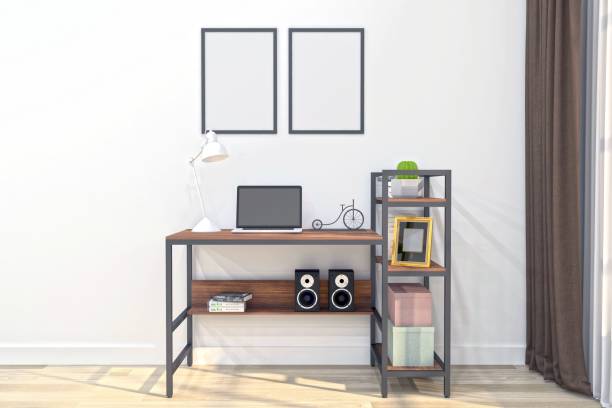 istock View of a working desk with a laptop and different objects in a room - 3D rendering 1441565060