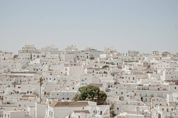 istock Beautiful view of short white buildings under a clear blue sky 1441565624