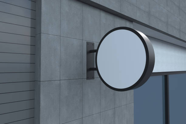 istock Closeup view of a blank square shaped billboard with a white space attached to the wall 1441566593