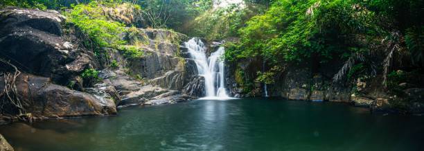 istock Waterfall flowing over rocks in Khlong Pla Kang, Wang Mi, Thailand 1441566651
