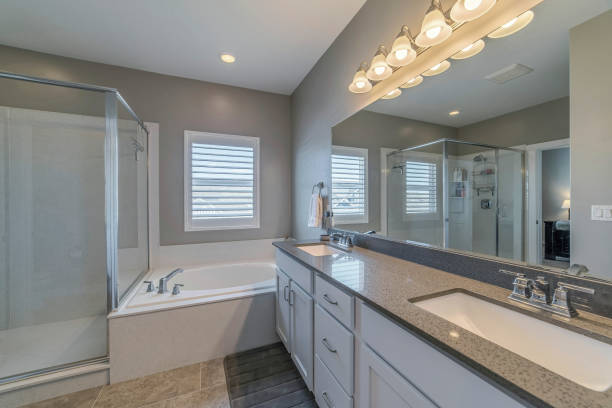 istock Minimalistic bathroom interior design in white color with a double sink 1441567465