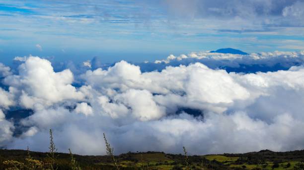 istock Scenic view of the clouds over the mountains 1441570073