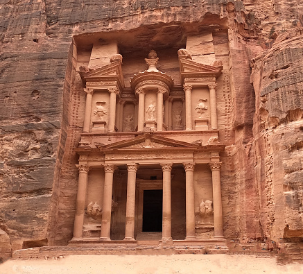 A low angle shot of the historic Treasury in Petra, Jordan