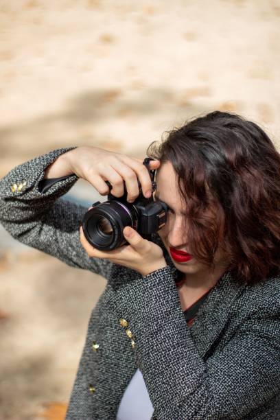 istock Woman taking photos. 1441570266