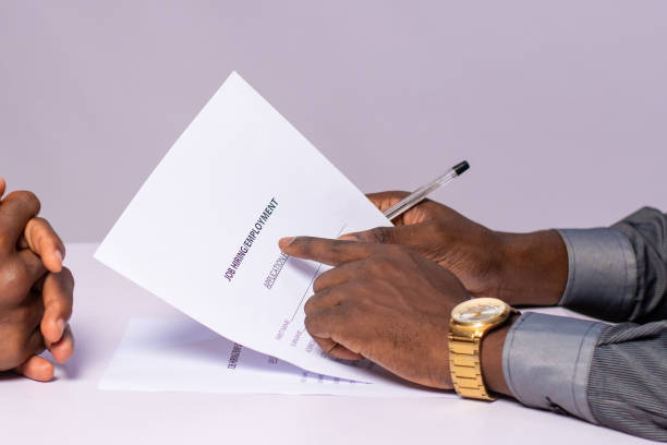 istock African businessman interviewing a job candidate in an office 1441571006