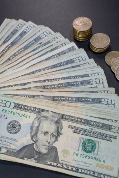 istock 20 dollar bills fanned out. 1441571058
