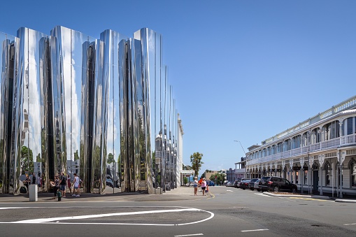 New Plymouth, New Zealand – January 11, 2019: Reflective stainless steel facade of the Len Lye Centre (Govett-Brewster Art Gallery) in New Plymouth, New Zealand.