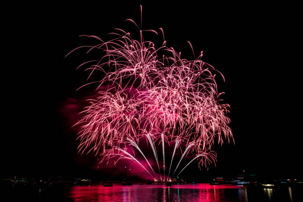 istock Fireworks over the Barbican Harbour, Plymouth, Devon, England, at night 1441571413