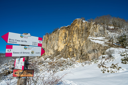 pesaro, Italy – January 09, 2022: The trail signs indicating the way to Mount Sasso Simone in Carpegna, Italy