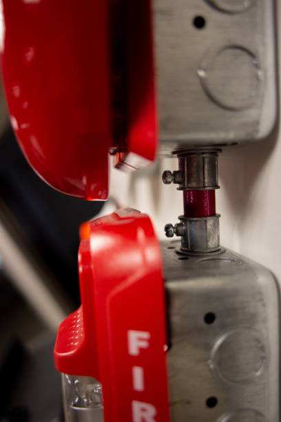 istock Vertical closeup of a red fire alarm system sensor 1441571758
