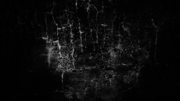 istock Closeup of a dark grunge background with white scratches with copyspace 1441572136