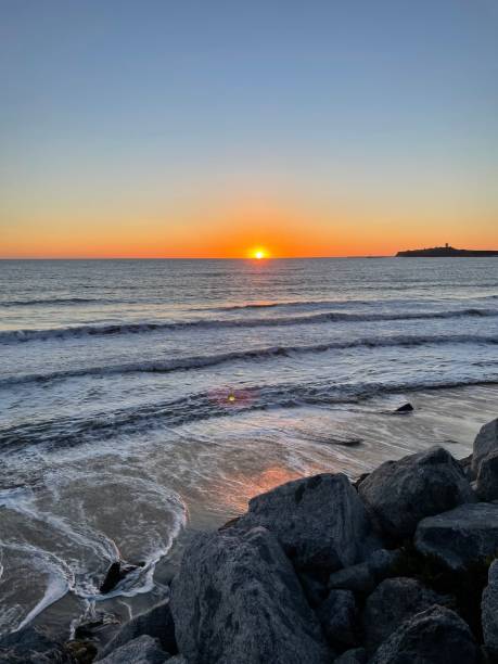 istock Vertical shot of a beautiful sea during the sunset 1441572349