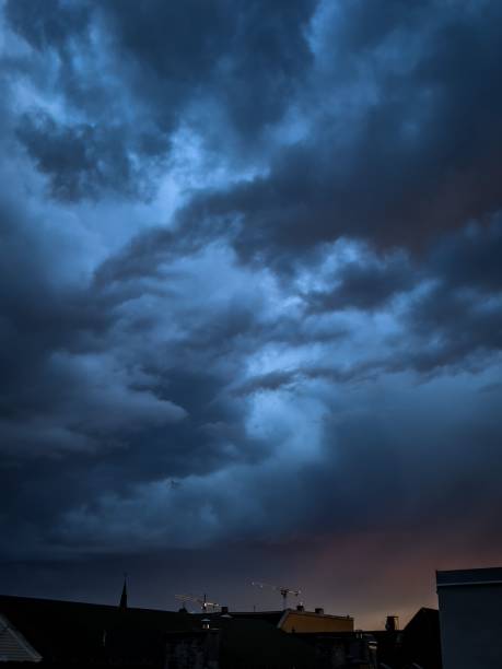 istock Vertical shot of dramatic clouds in the sky in the evening 1441572606