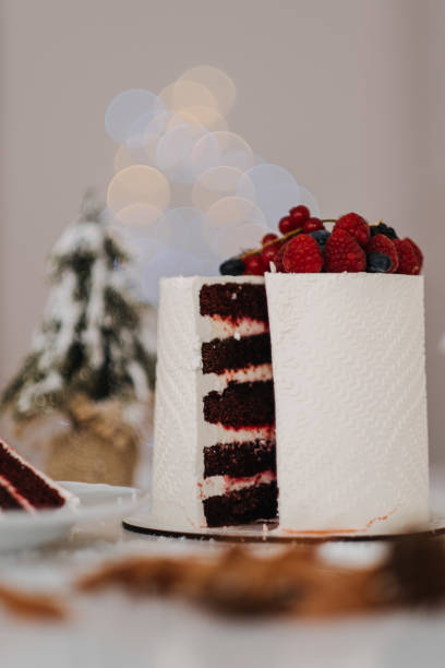 istock Vertical shot of a cut chocolate cake with berries 1441574844