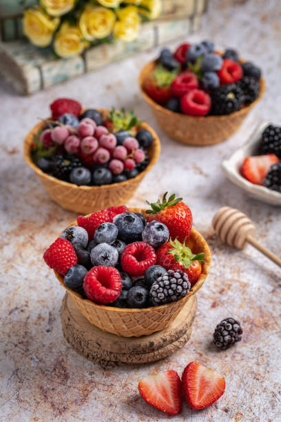 istock Vertical shot of various fresh berries on a table 1441575150