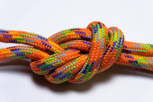 istock Closeup shot of a rope on a white background 1441575336
