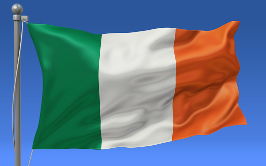 Ireland flag waving on the flagpole on a sky background