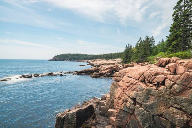 istock Scenic view of cliffs and vegetation next to a waterscape 1441577571