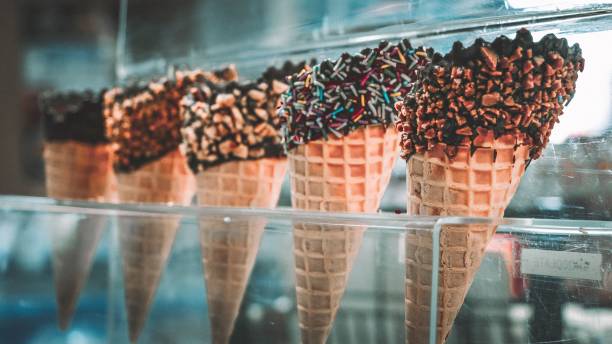 istock Selective focus shot of ice cream cones with chocolate 1441577630