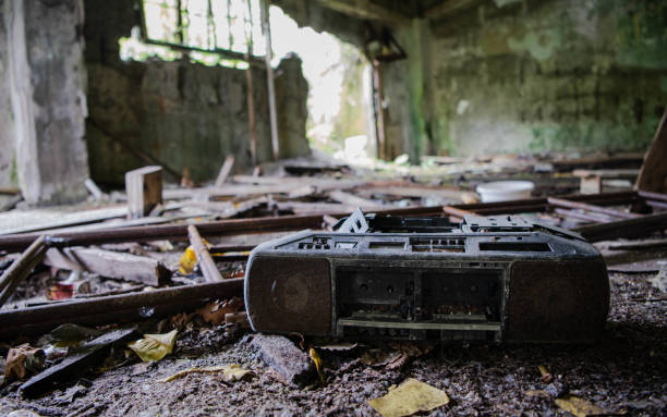 retro broken and outdated portable stereo left in abandoned building