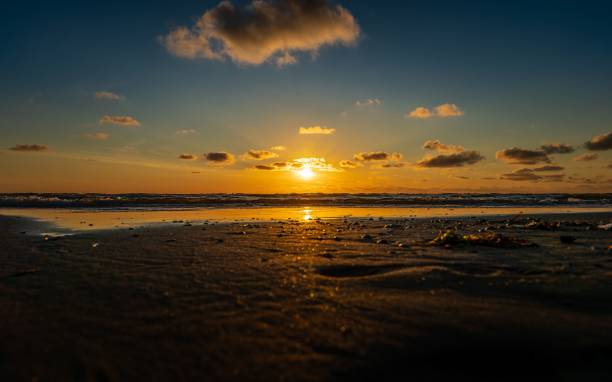 istock Beautiful view of an empty beach at sunset 1441578634