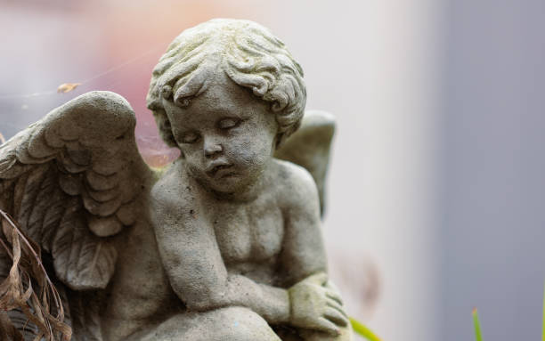 istock Selective focus shot of a stone angel statue 1441579826