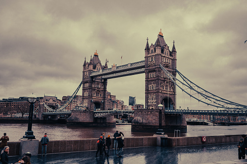 LONDON, United Kingdom – January 13, 2022: The Tower Bridge in foggy and rainy day. London, UK