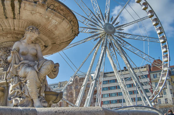 Budapest, Hungary – March 11, 2017: Budapest nightlife attraction Eye and Danubius Fountain on Elizabeth Square Ter