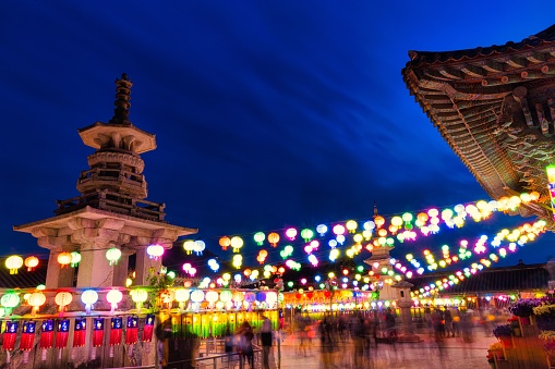 A beautiful shot of the colorful lighting Asian lanterns hanging in Bulguksa temple in Gyeongju, South Korea on Buddha's Birthday