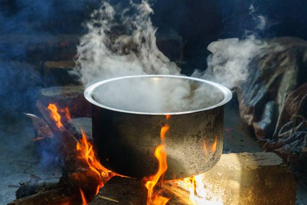 istock Closeup of a cooking pot on a burning fire 1441585330