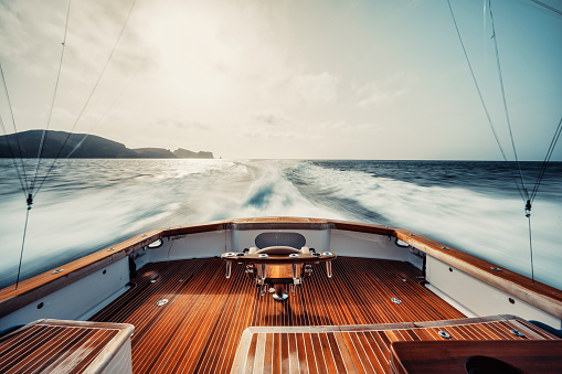 A scenic view of a large boat's stern